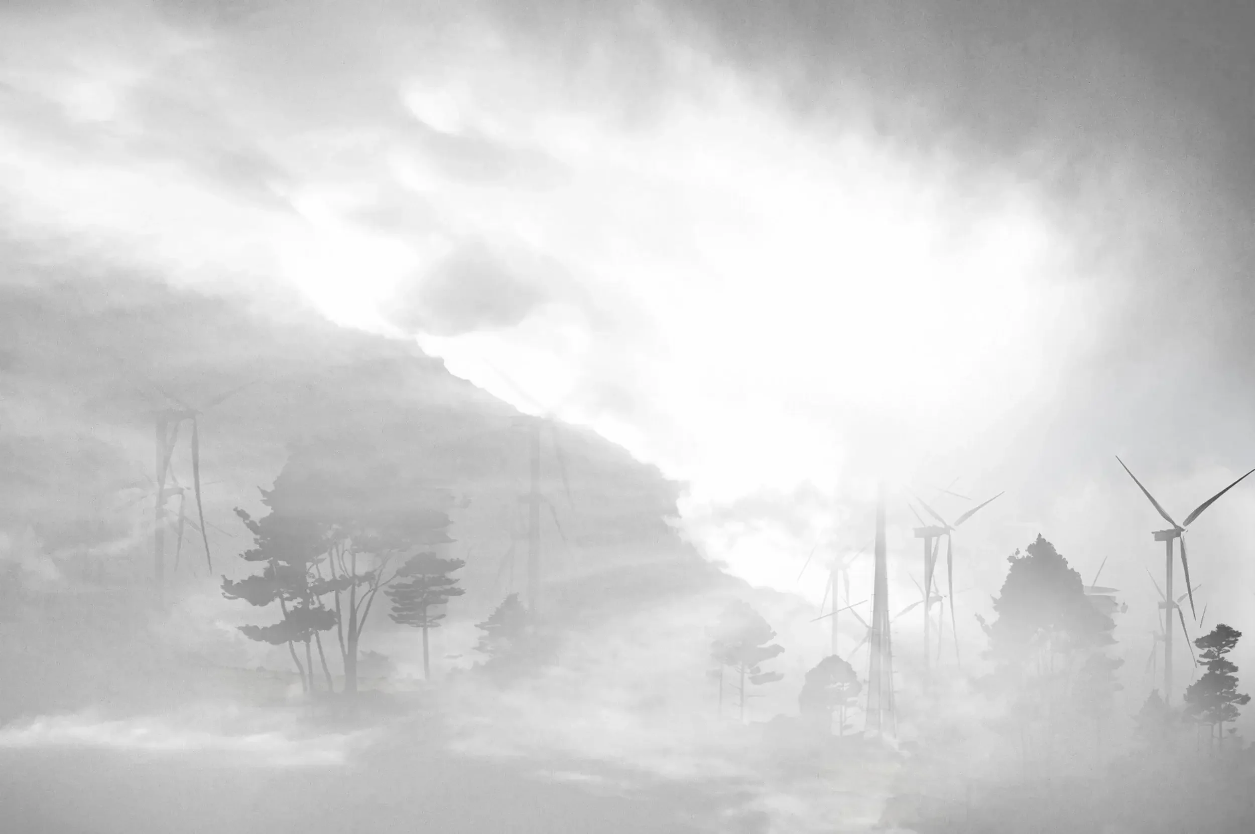 Wind turbines emerging from mountain fog